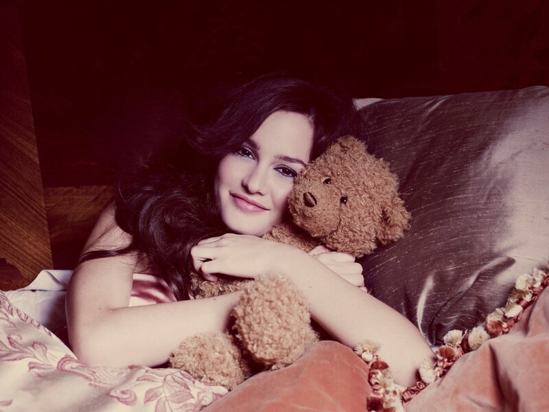 woman holding teddy bear
