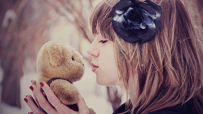 Woman Holding Teddy Bear — Brown, Peaceful, Winter