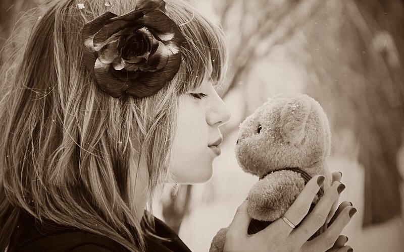 Woman Holding Teddy Bear — Brown, Serene