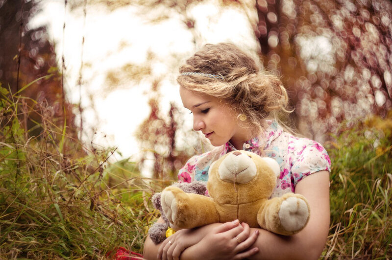 Woman Holding Teddy Bear — Green