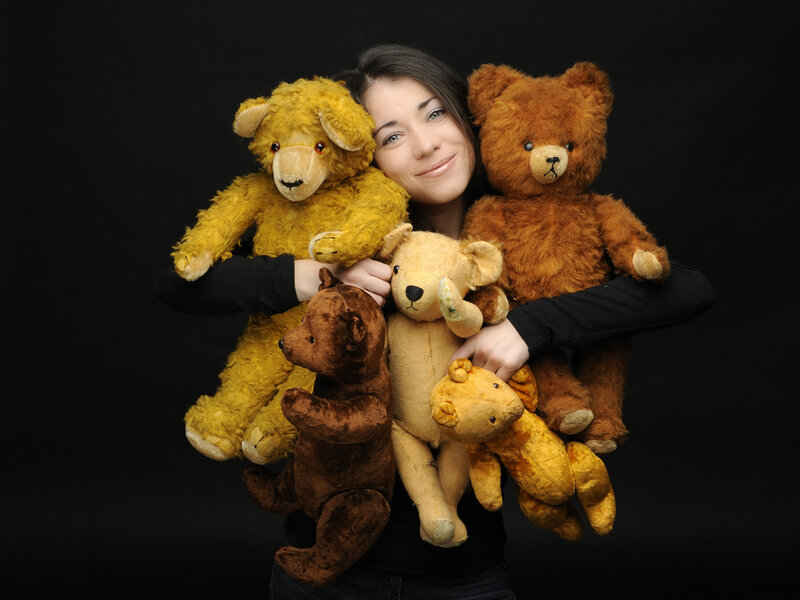 Woman Holding Teddy Bears
