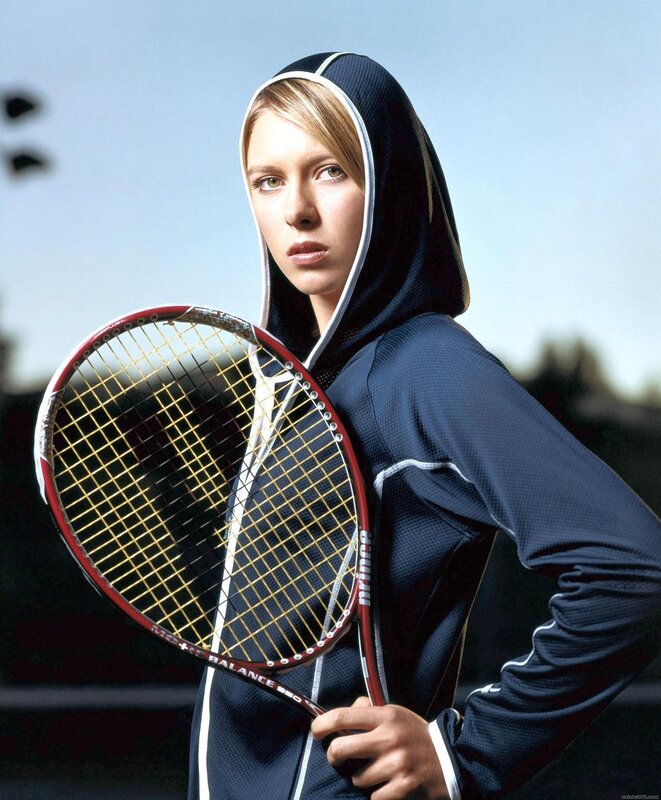woman holding tennis racket