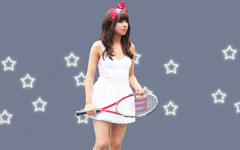 woman holding tennis racket