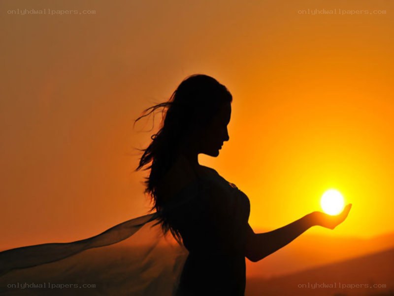 woman holding the sun