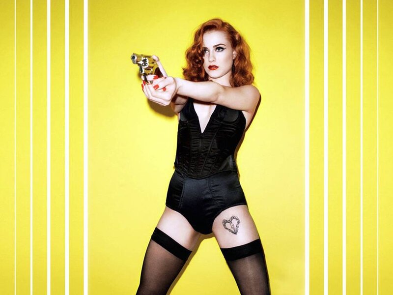 Woman Holding Toy Gun
