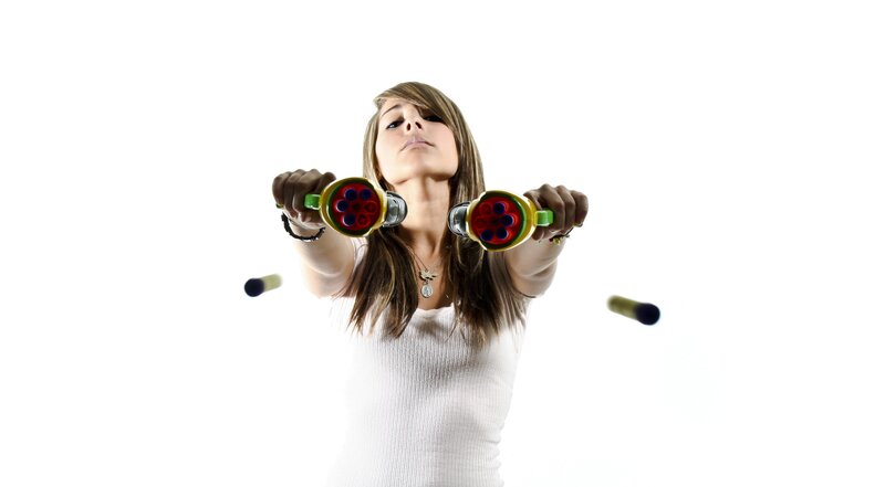 Woman holding toy guns
