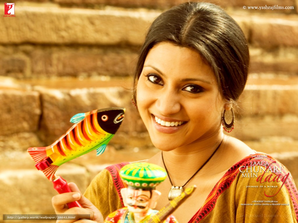 woman holding traditional toys