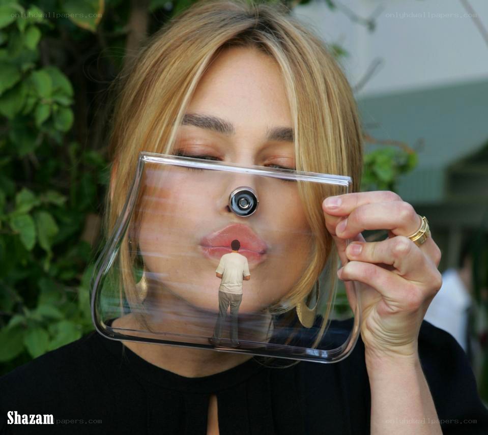 woman holding transparent object