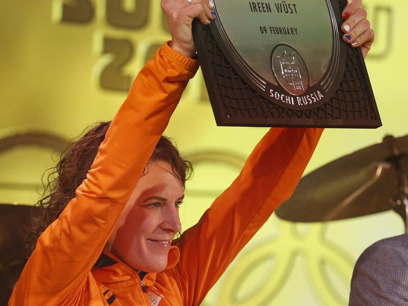 Woman Holding Trophy — Orange