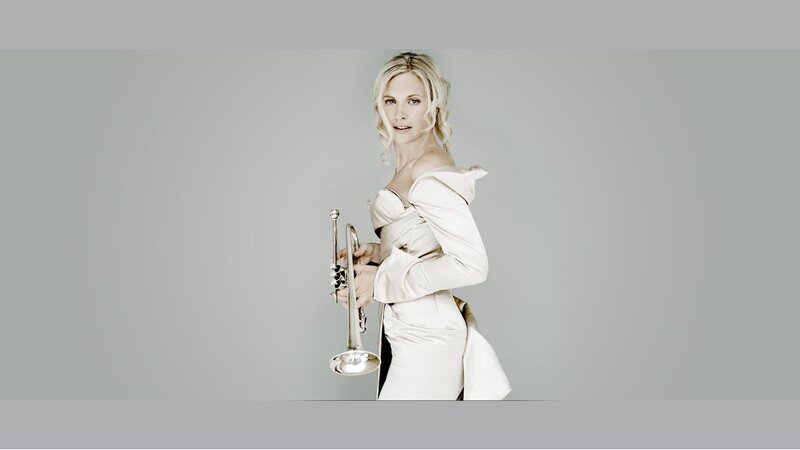 Woman Holding Trumpet