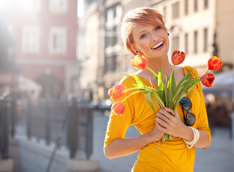 Woman Holding Tulips — Yellow, Happy