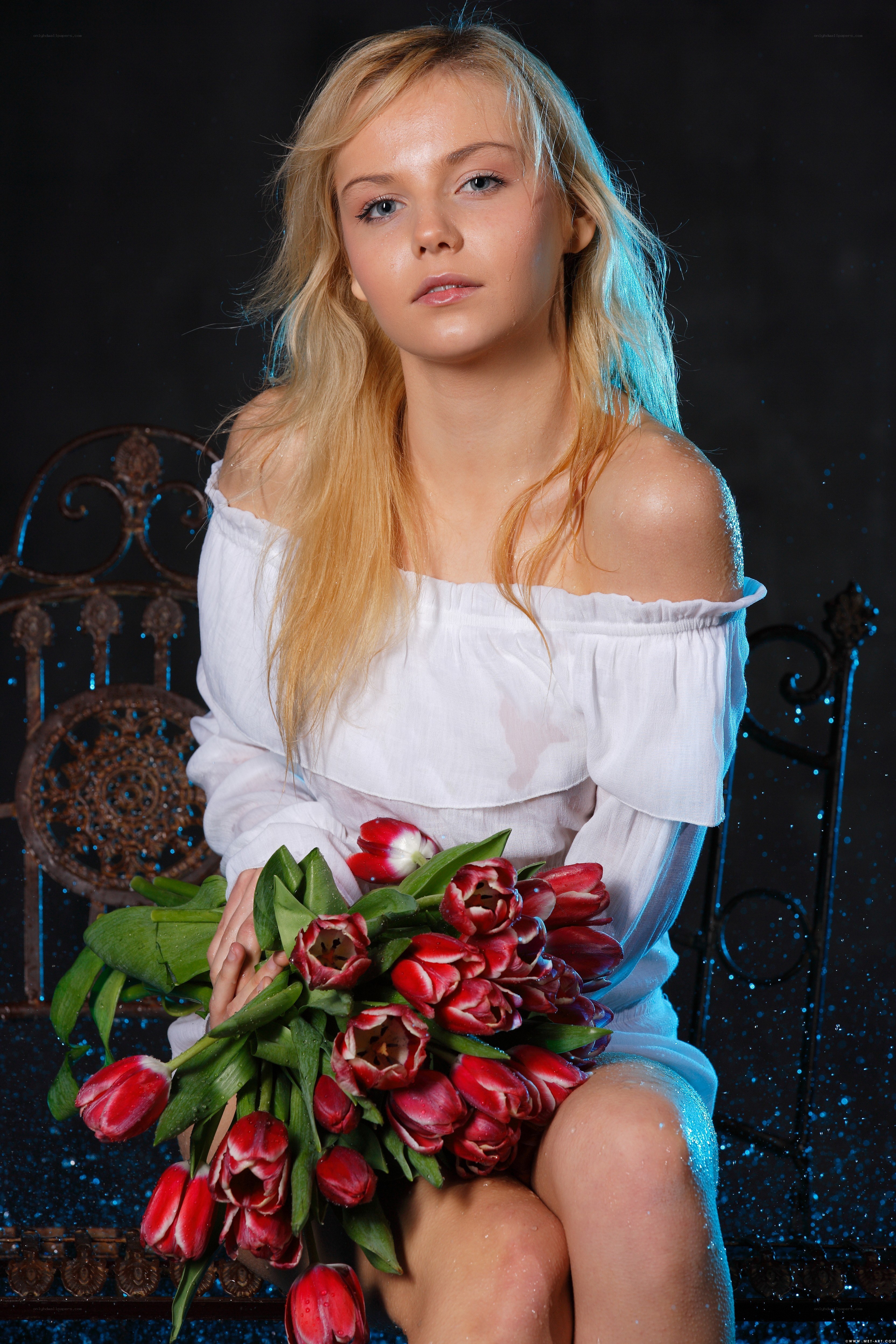 woman holding tulips