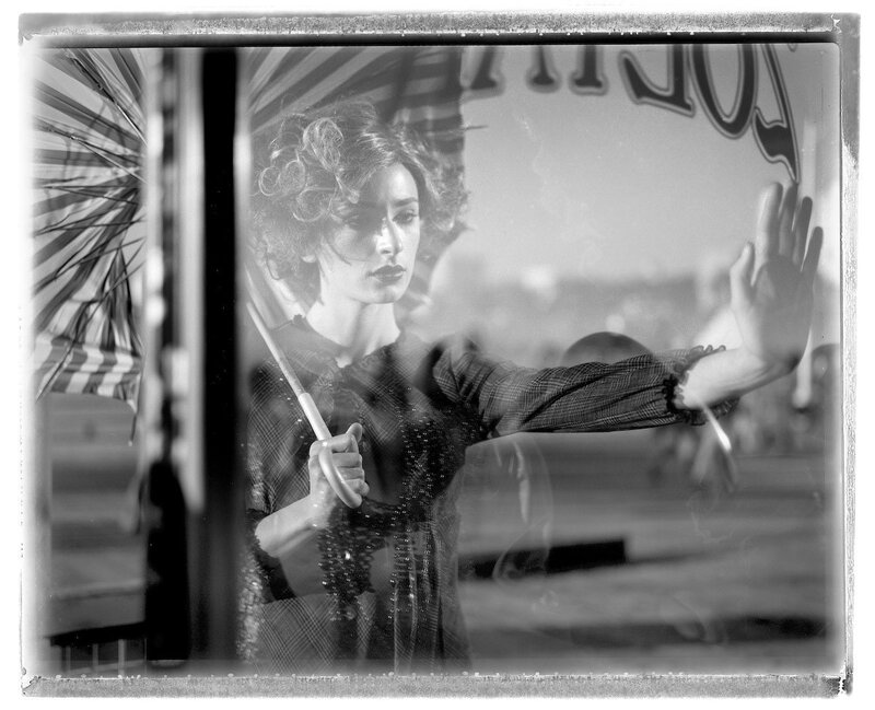 Woman Holding Umbrella — Black, Dramatic, Photograph
