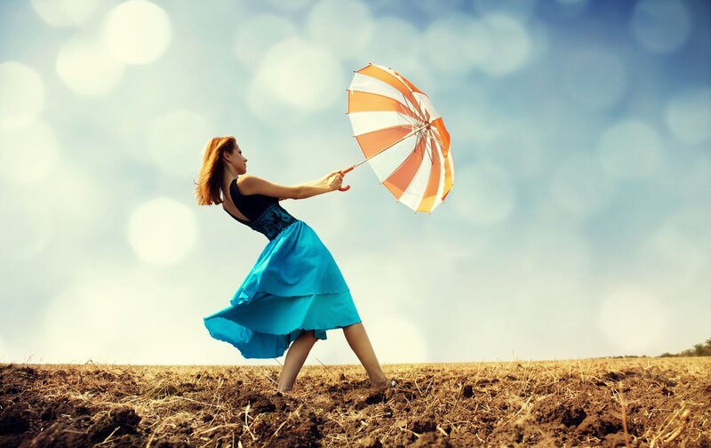 Woman Holding Umbrella — Blue, Dramatic, Afternoon