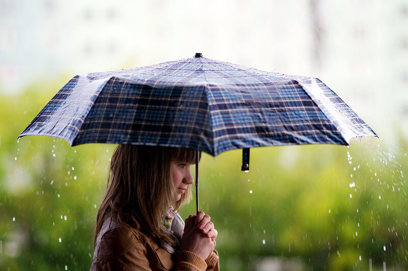 Woman Holding Umbrella — Blue