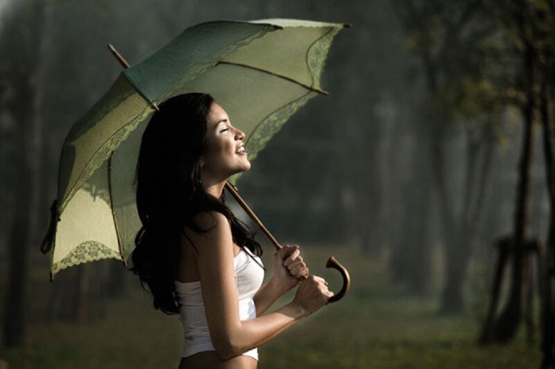 Woman Holding Umbrella — Green, Serene