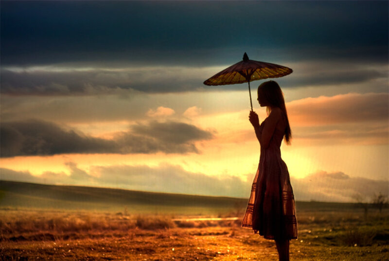 Woman Holding Umbrella — Orange