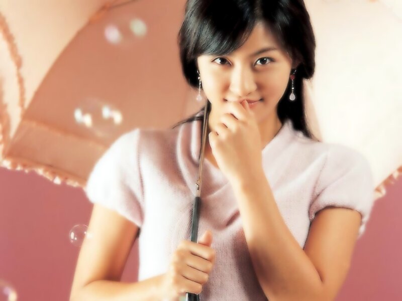 Woman Holding Umbrella — Pink