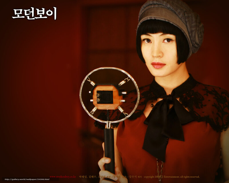 woman holding vintage microphone