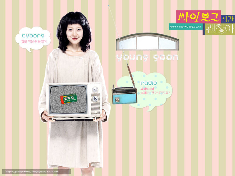 woman holding vintage TV