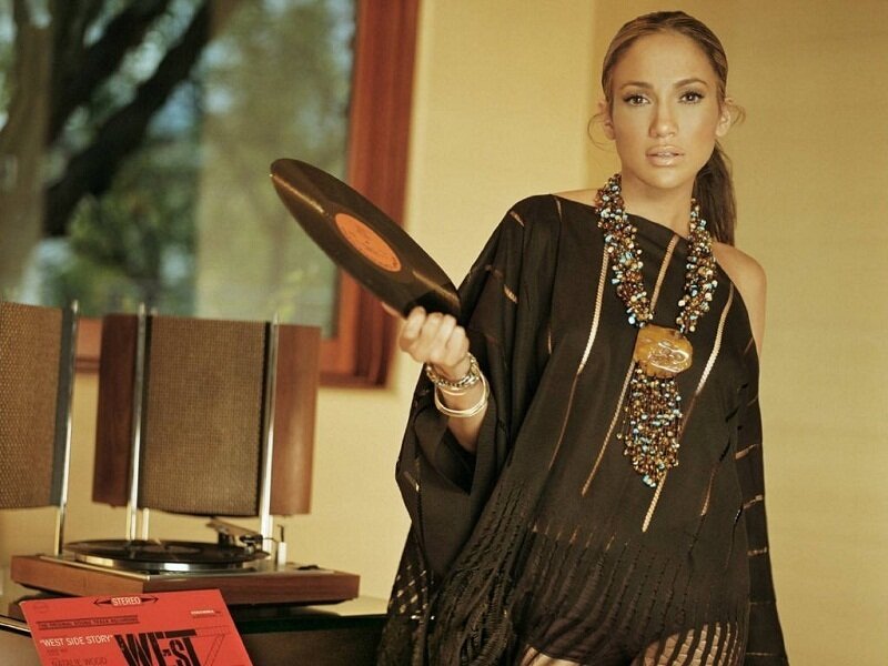 Woman Holding Vinyl Record — Black