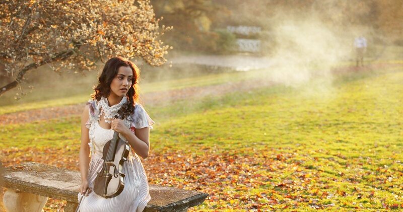 Woman Holding Violin — Green, Serene