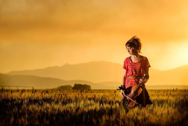 Woman Holding Violin — Yellow, Dramatic, Sunset