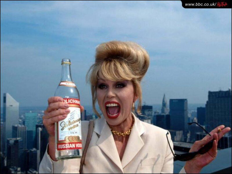 Woman Holding Vodka Bottle — Blue