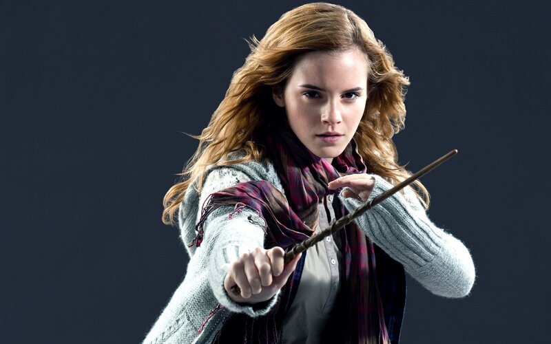 Woman Holding Wand — Gray, Dramatic