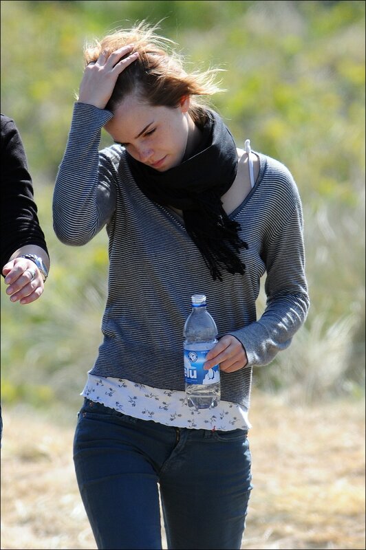 woman holding water bottle