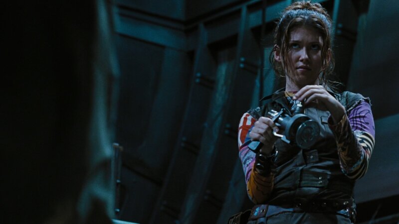 Woman Holding Weapon — Blue, Tense