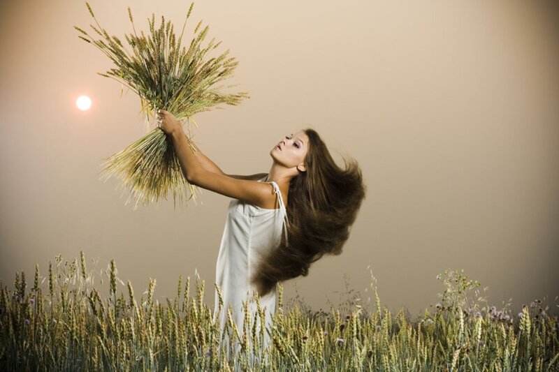 Woman Holding Wheat — Beige