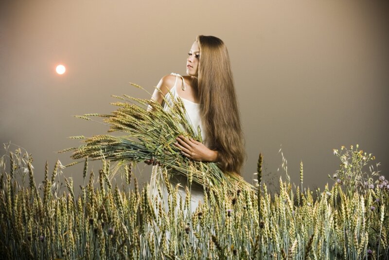 Woman Holding Wheat — White