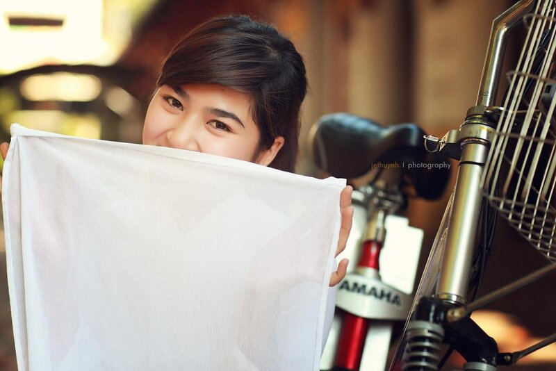 woman holding white cloth