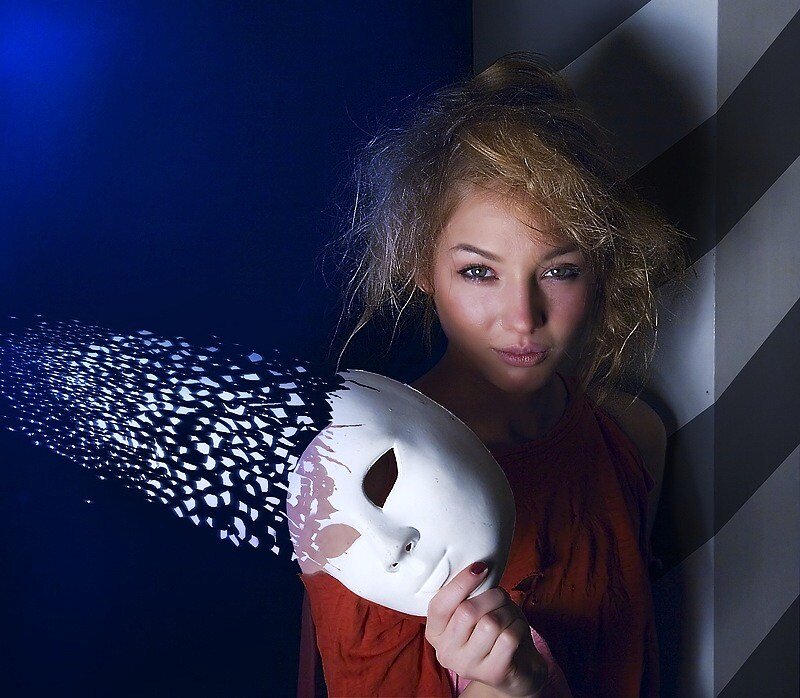 woman holding white mask