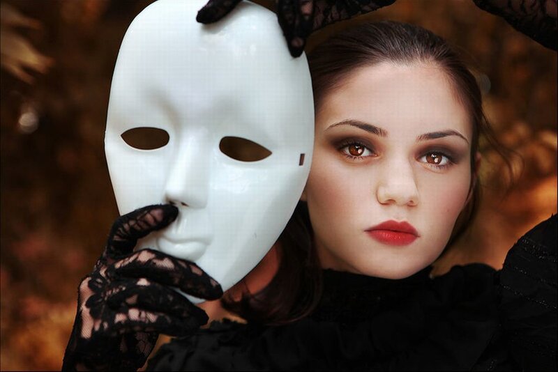 Woman Holding White Mask — Black