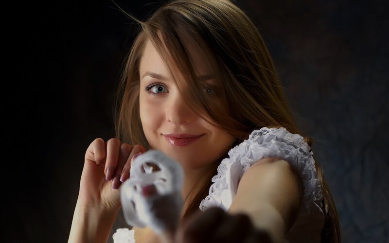 woman holding white object