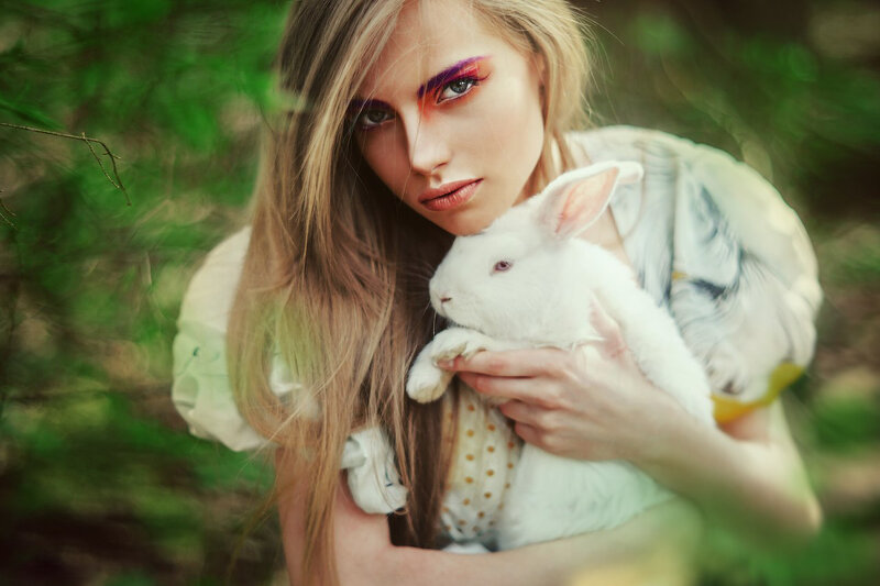 Woman Holding White Rabbit — Green, Serene