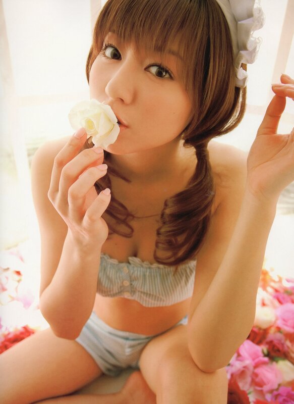 woman holding white rose