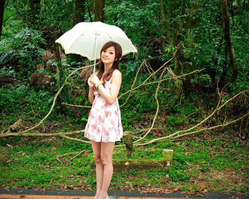 Woman Holding White Umbrella — Green