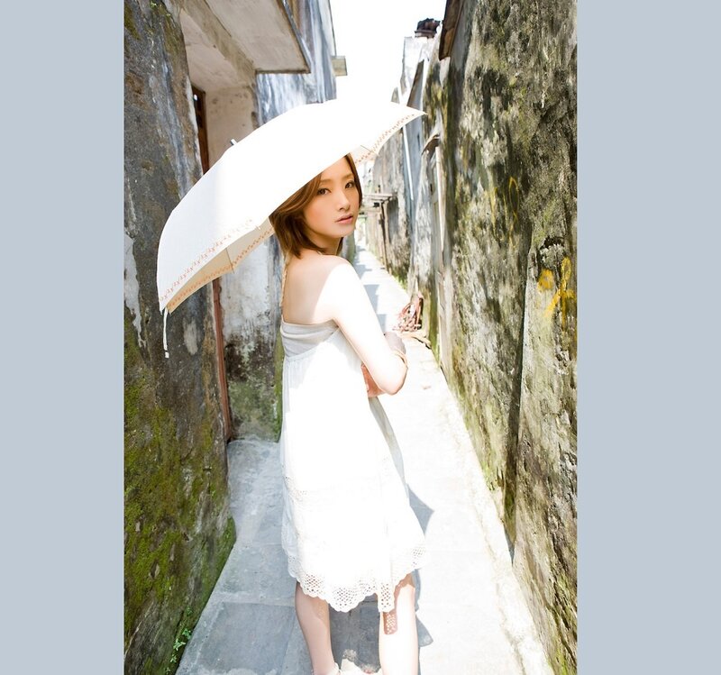 Woman Holding White Umbrella — Serene
