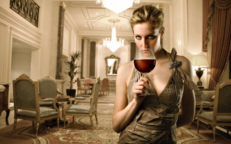 woman holding wine glass