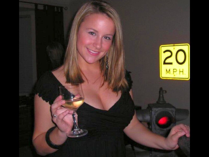 woman holding wine glass