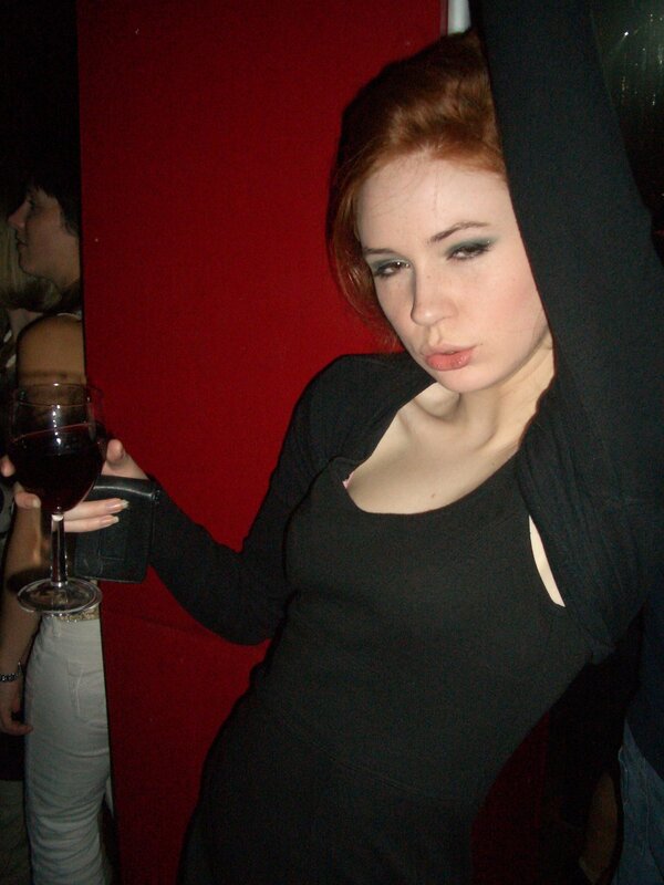 woman holding wine glass