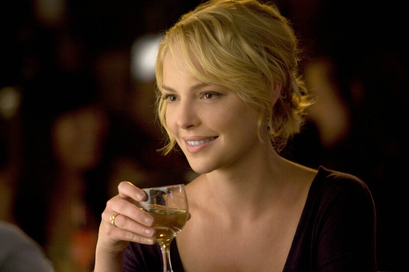 woman holding wine glass