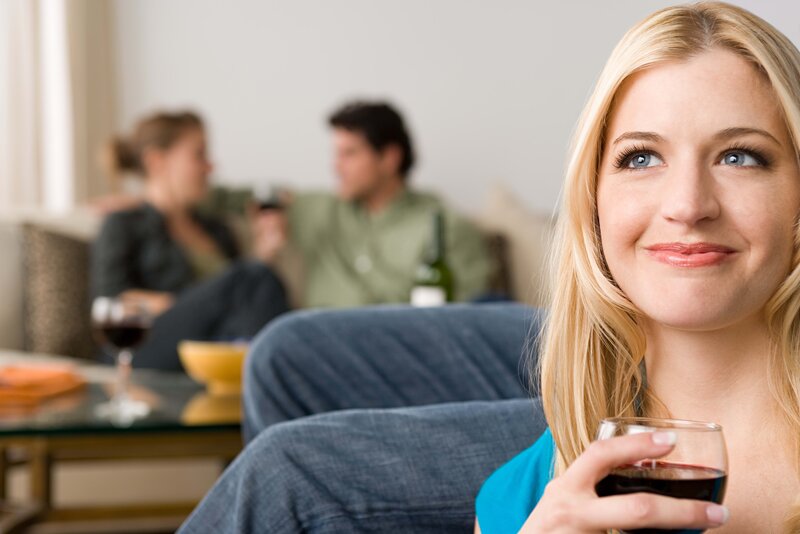 woman holding wine glass