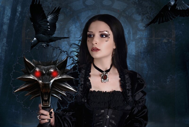 Woman Holding Wolf-head Staff