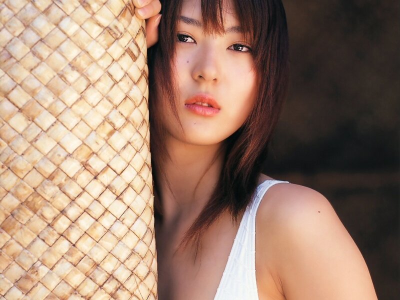 woman holding woven basket