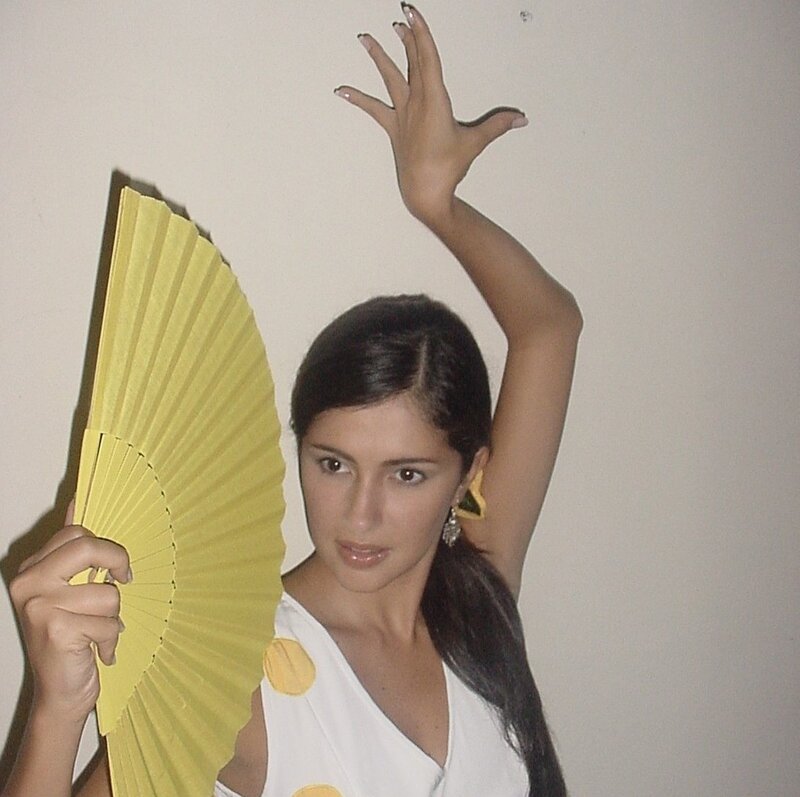 Woman Holding Yellow Fan