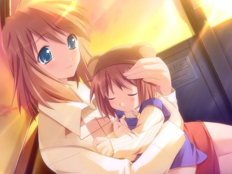 Woman Holding Young Girl